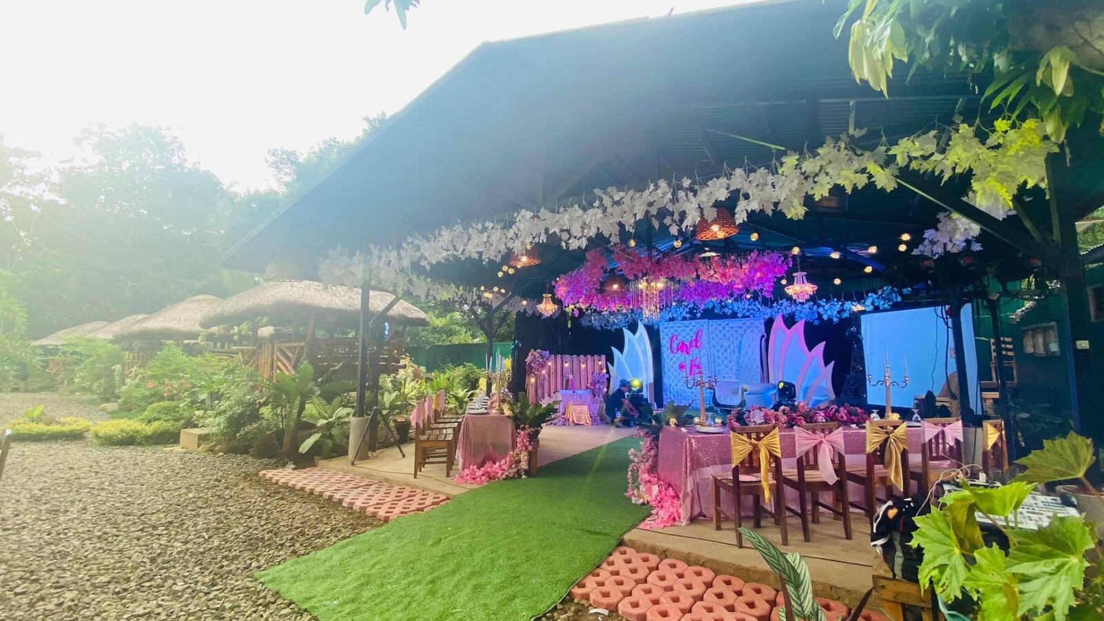 Open air hall dressed for a garden celebration